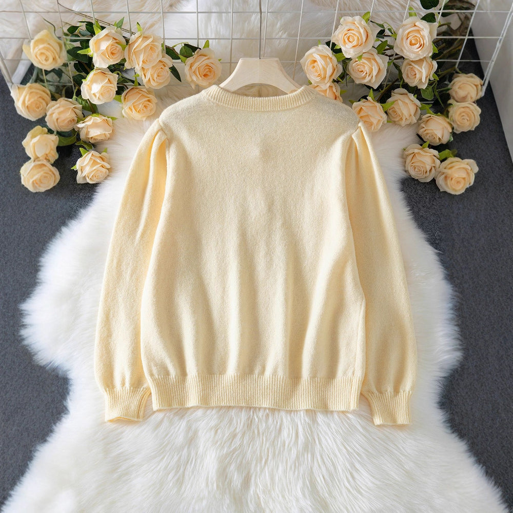 Eleganter Cardigan mit Knöpfen und Lochmuster